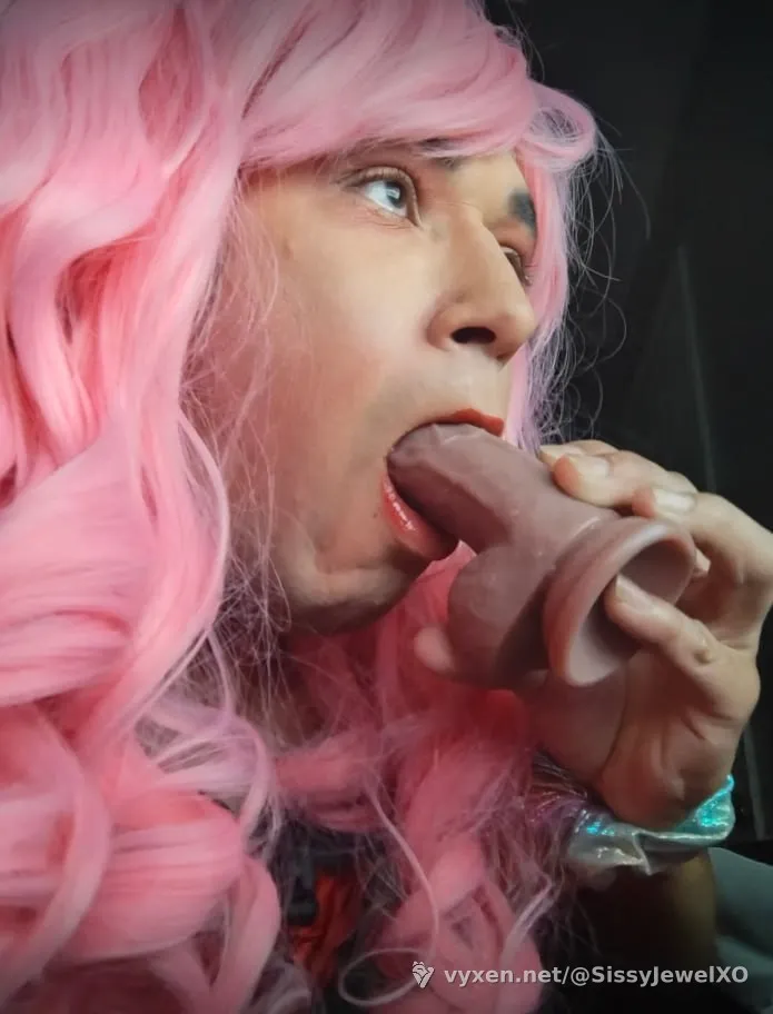 Mouth stuffed, lips glossed, brain empty. Stare at the sissy. 💋